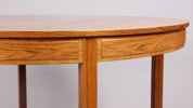 Rosewood dining table by Bertil Fridhagen