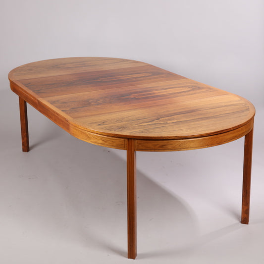 Rosewood dining table by Bertil Fridhagen