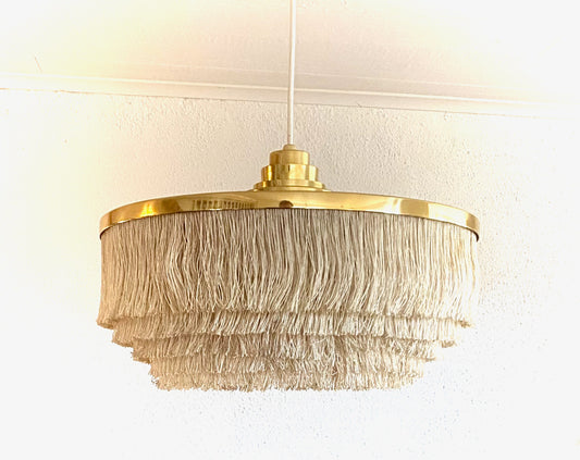 Hans-Agne Jakobsson. T-603, franslampa i mässing