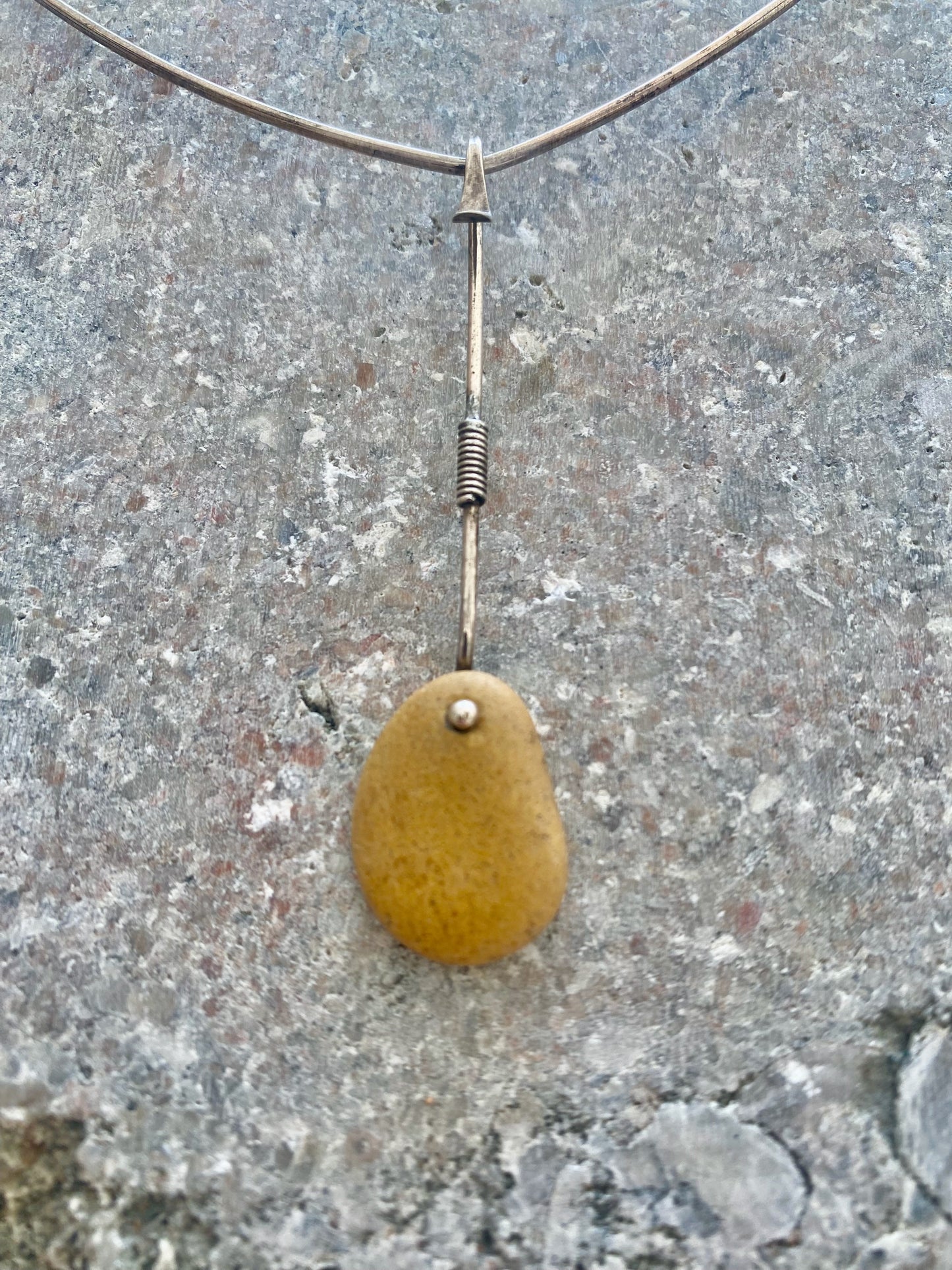 Vivianna Torun Bülow Hübe - Neckring with silver and natural stone pendant.