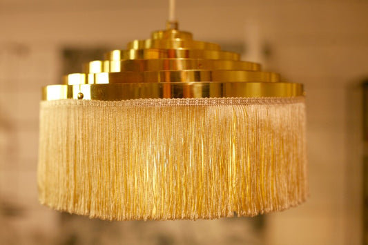 Brass fringe lamp by Hans-Agne Jakobsson